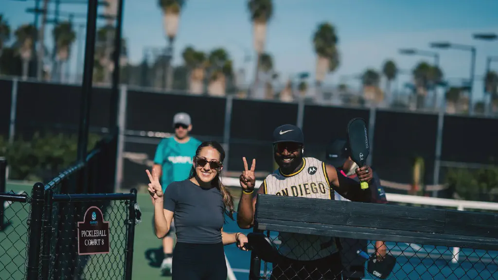 A widebody, hybrid and elongated pickleball paddle shown side by side to compare their face shapes