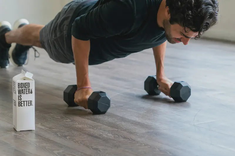 Flat resistance bands, mini loop bands and handled tube resistance bands arranged for a compact home workout